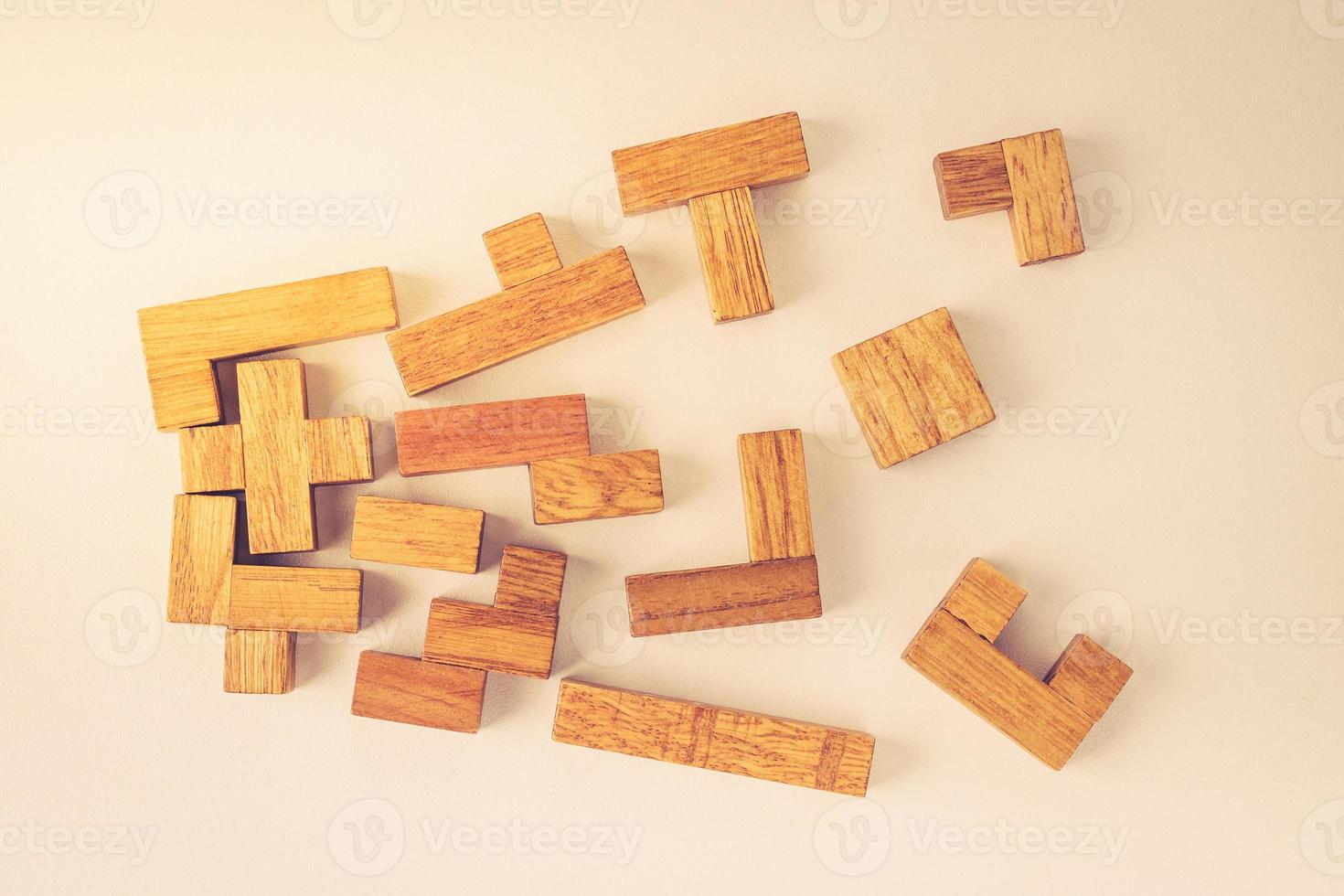 Different shapes wooden blocks on white background photo