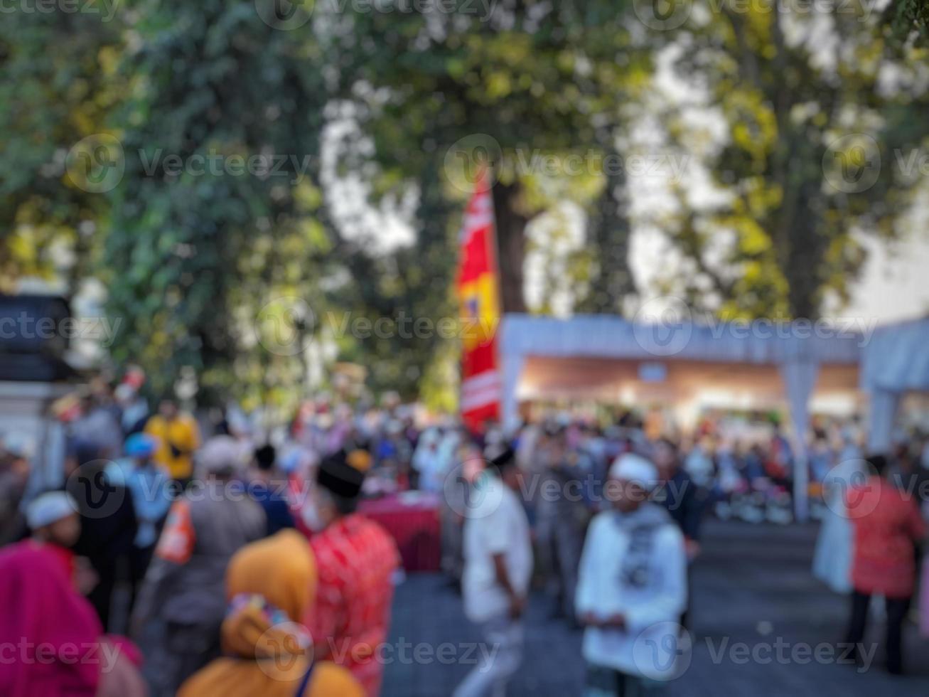 abstract blurred background of people attending ceremonial events photo