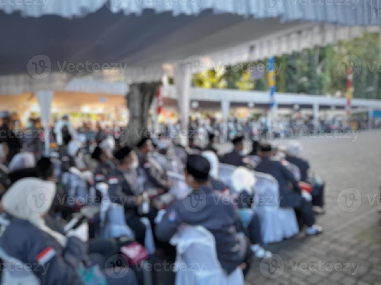 abstract blurred background of people attending ceremonial events photo