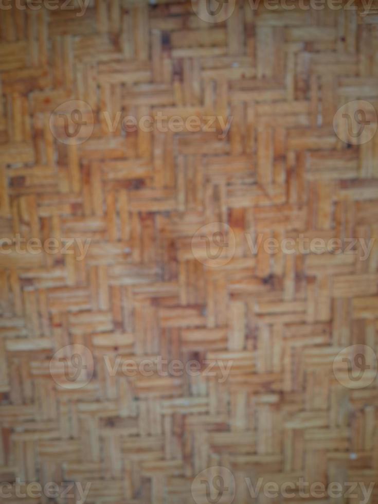 Defocused abstract background of woven bamboo crafts photo