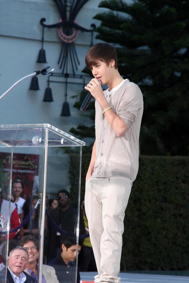 LOS ANGELES, JAN 26 - Justin Bieber speaks at the Michael Jackson Immortalized Handprint and Footprint Ceremony at Graumans Chinese Theater on January 26, 2012 in Los Angeles, CA photo