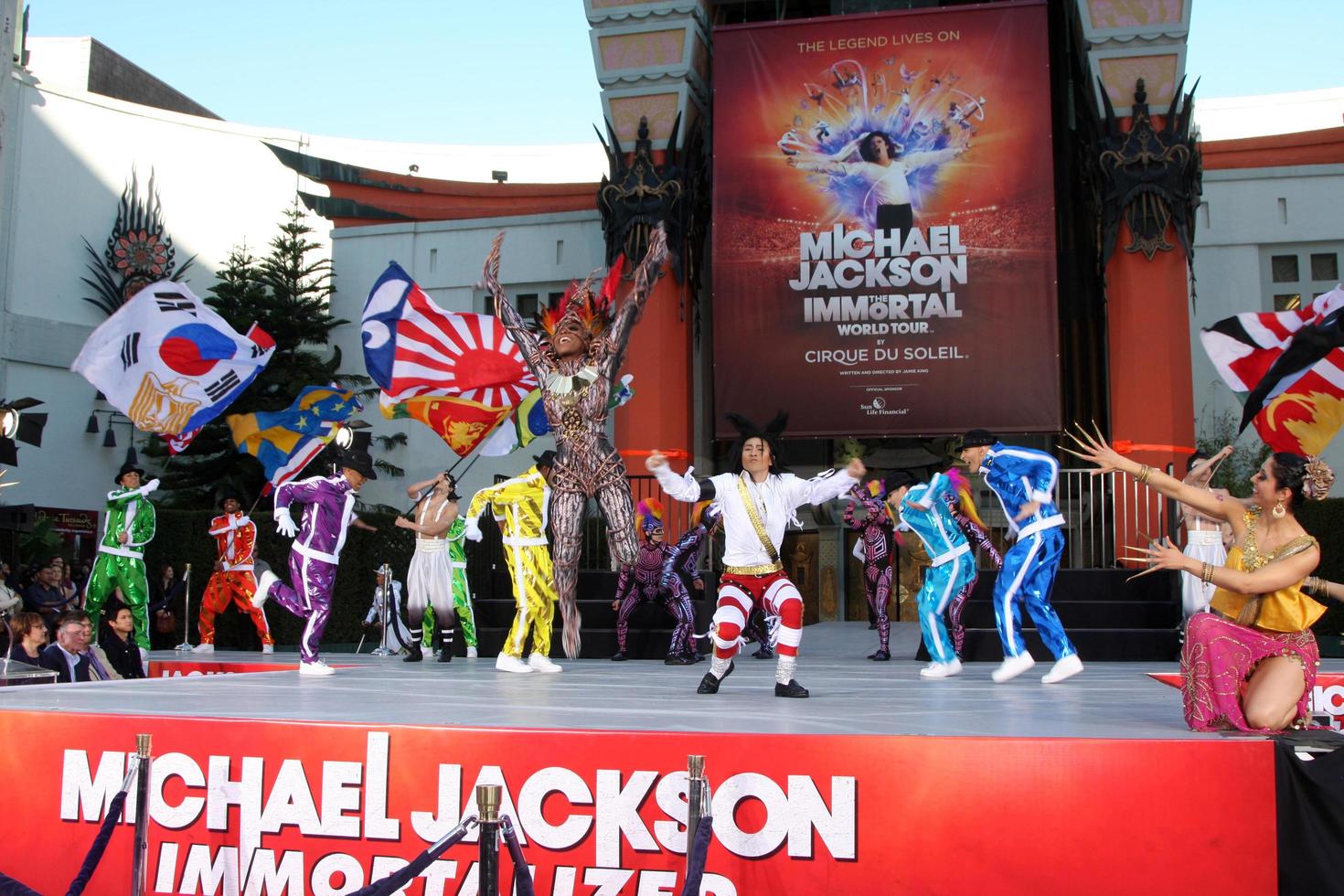 LOS ANGELES, JAN 26 - Cirque du Soleil Immortal Troupe perform at the Michael Jackson Immortalized Handprint and Footprint Ceremony at Graumans Chinese Theater on January 26, 2012 in Los Angeles, CA photo
