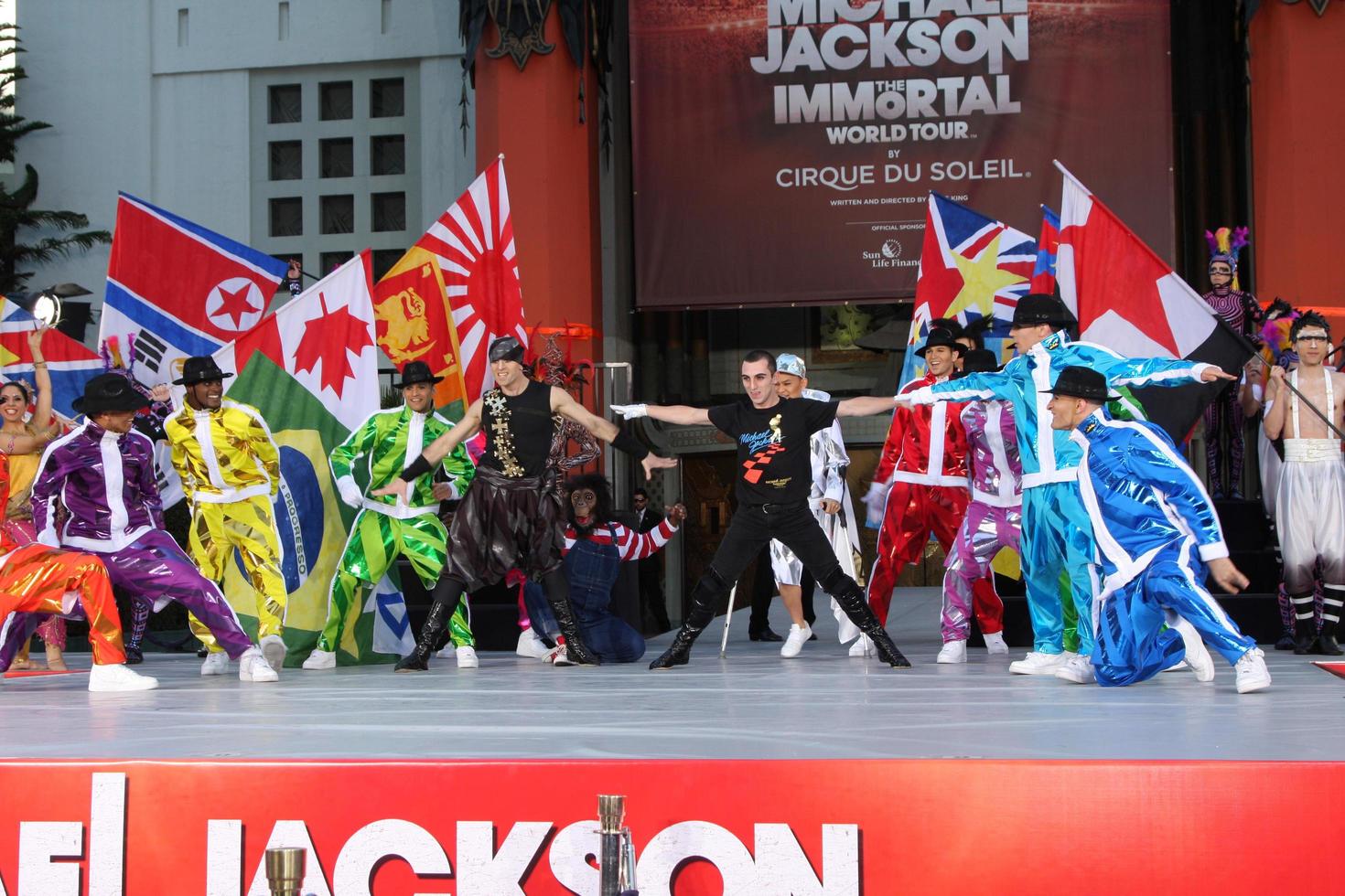 LOS ANGELES, JAN 26 - Cirque du Soleil Immortal Troupe perform at the Michael Jackson Immortalized Handprint and Footprint Ceremony at Graumans Chinese Theater on January 26, 2012 in Los Angeles, CA photo