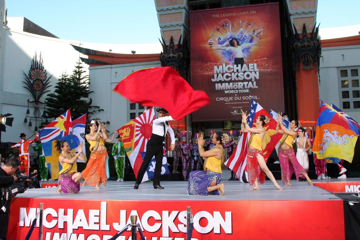 LOS ANGELES, JAN 26 - Cirque du Soleil Immortal Troupe perform at the Michael Jackson Immortalized Handprint and Footprint Ceremony at Graumans Chinese Theater on January 26, 2012 in Los Angeles, CA photo