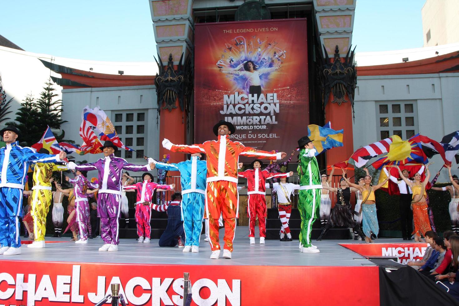 LOS ANGELES, JAN 26 - Cirque du Soleil Immortal Troupe perform at the Michael Jackson Immortalized Handprint and Footprint Ceremony at Graumans Chinese Theater on January 26, 2012 in Los Angeles, CA photo