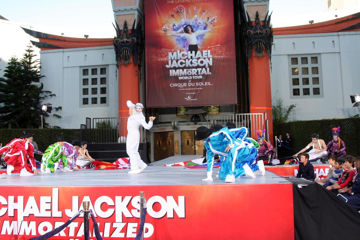 LOS ANGELES, JAN 26 - Cirque du Soleil Immortal Troupe perform at the Michael Jackson Immortalized Handprint and Footprint Ceremony at Graumans Chinese Theater on January 26, 2012 in Los Angeles, CA photo
