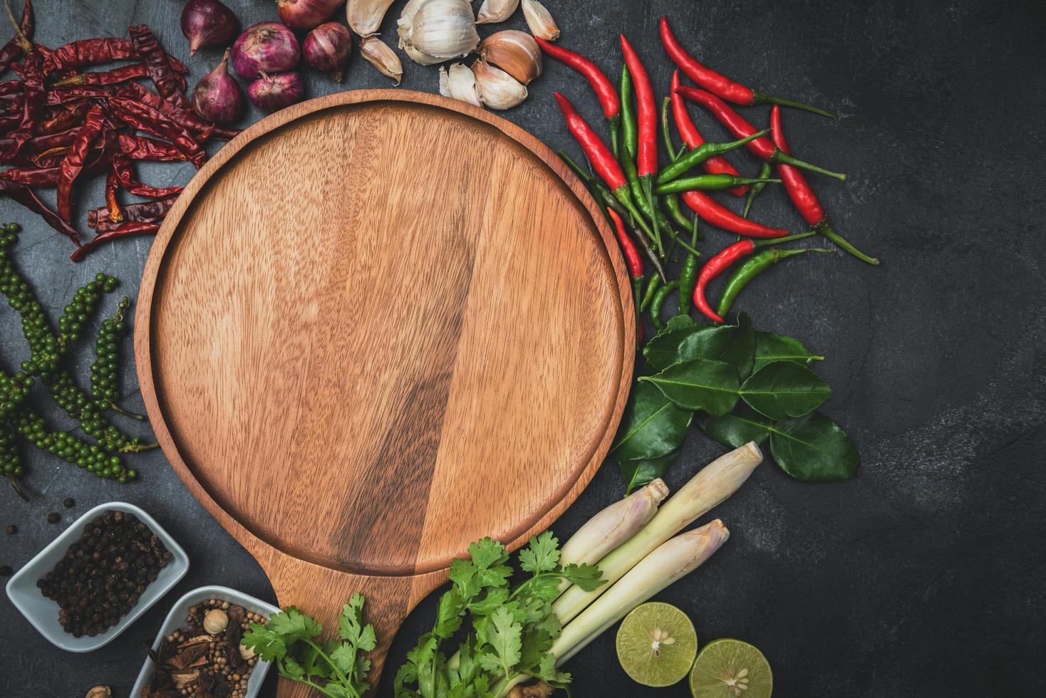 Healthy food clean eating selection. Herbs and spices Various organic vegetables Placed on the table. Raw materials of cooking preparation. photo