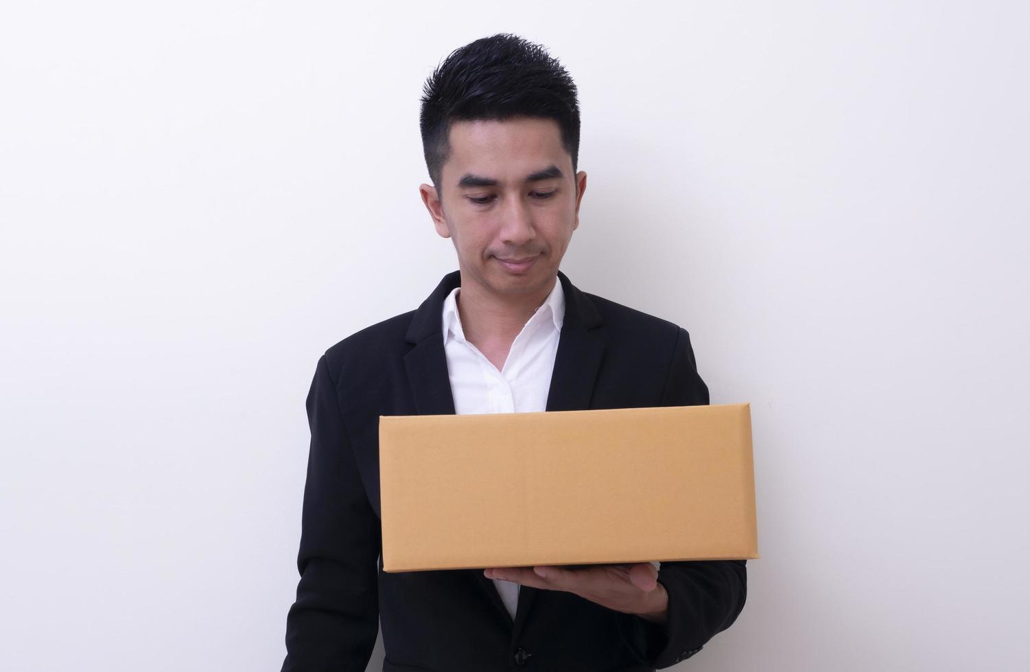 Shop assistant brings the parcel, isolated, white background photo