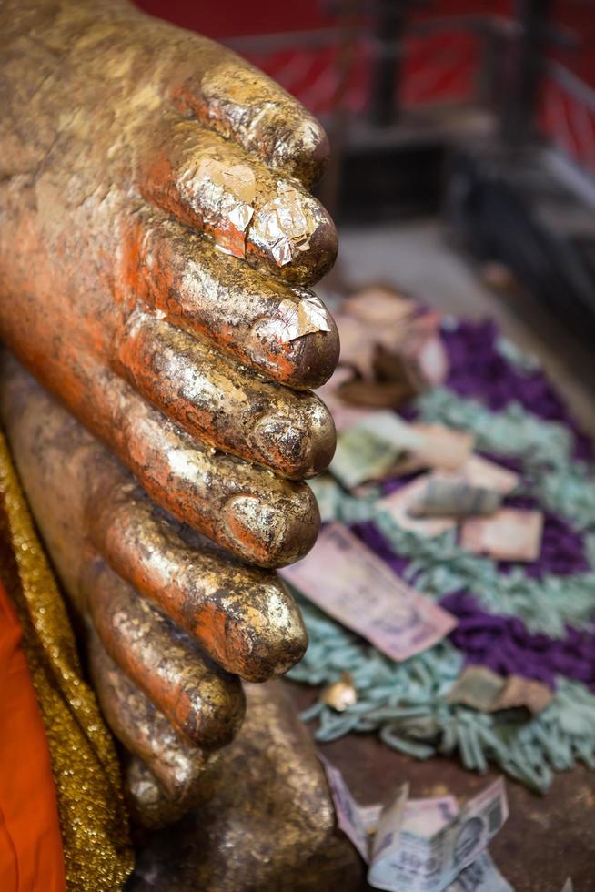 Reclining Buddha gold statue photo