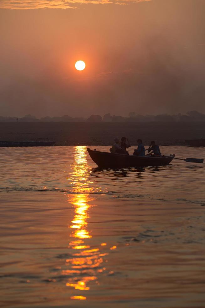 Sunrise on the Ganga river, Varanasi, India photo