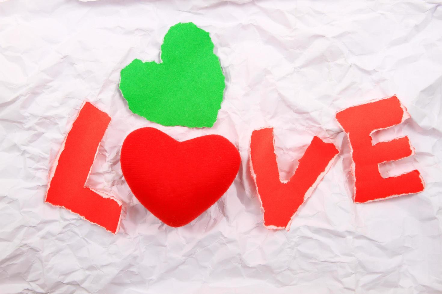 Love text   red  on a white background. photo