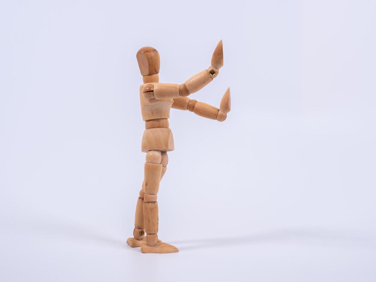 Wooden mannequin push anything , Wooden figure action photo