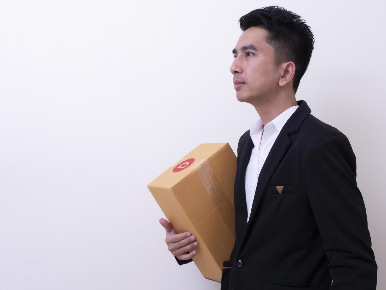 Shop assistant brings the parcel, isolated, white background photo