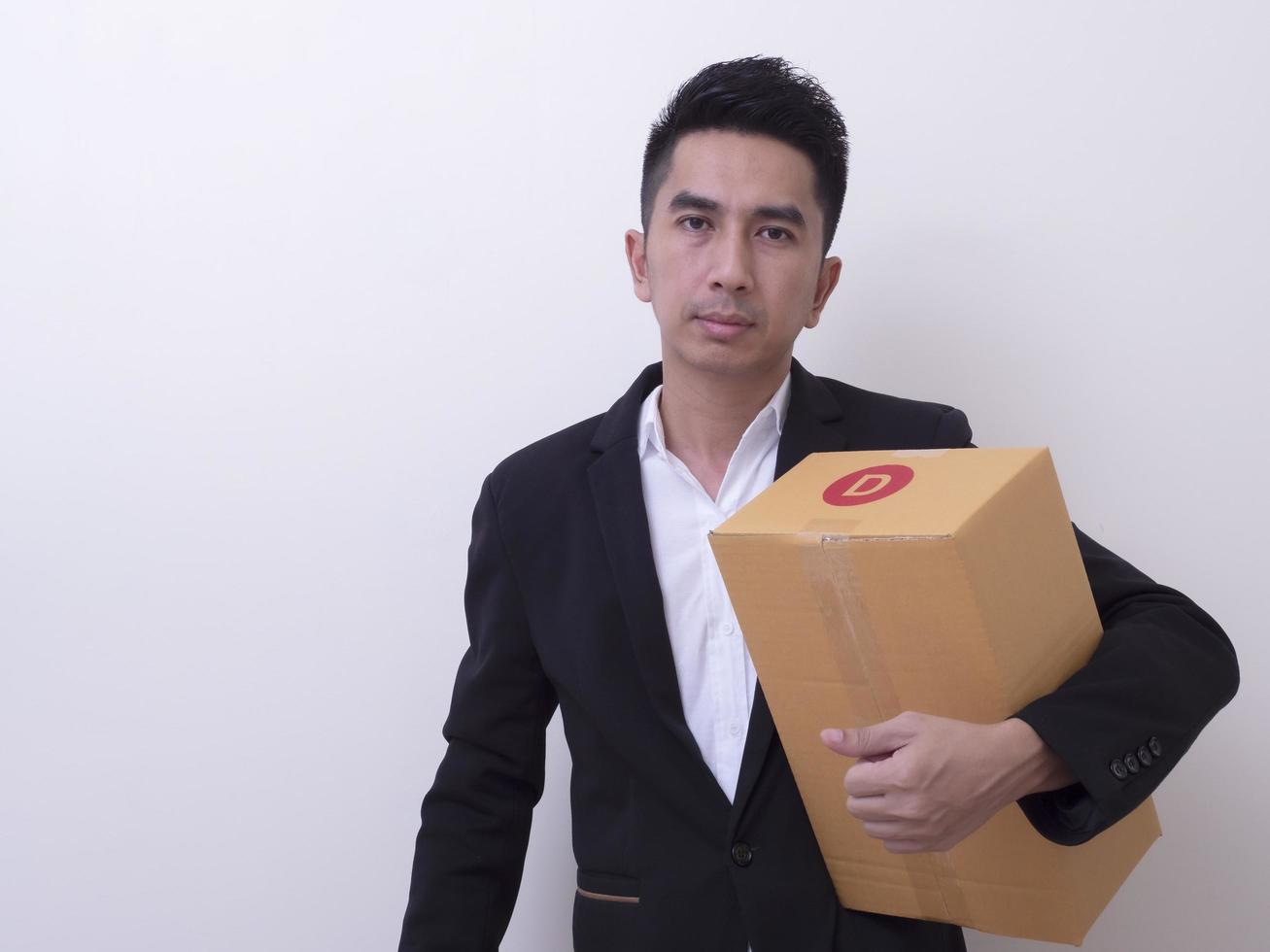 Shop assistant brings the parcel, isolated, white background photo