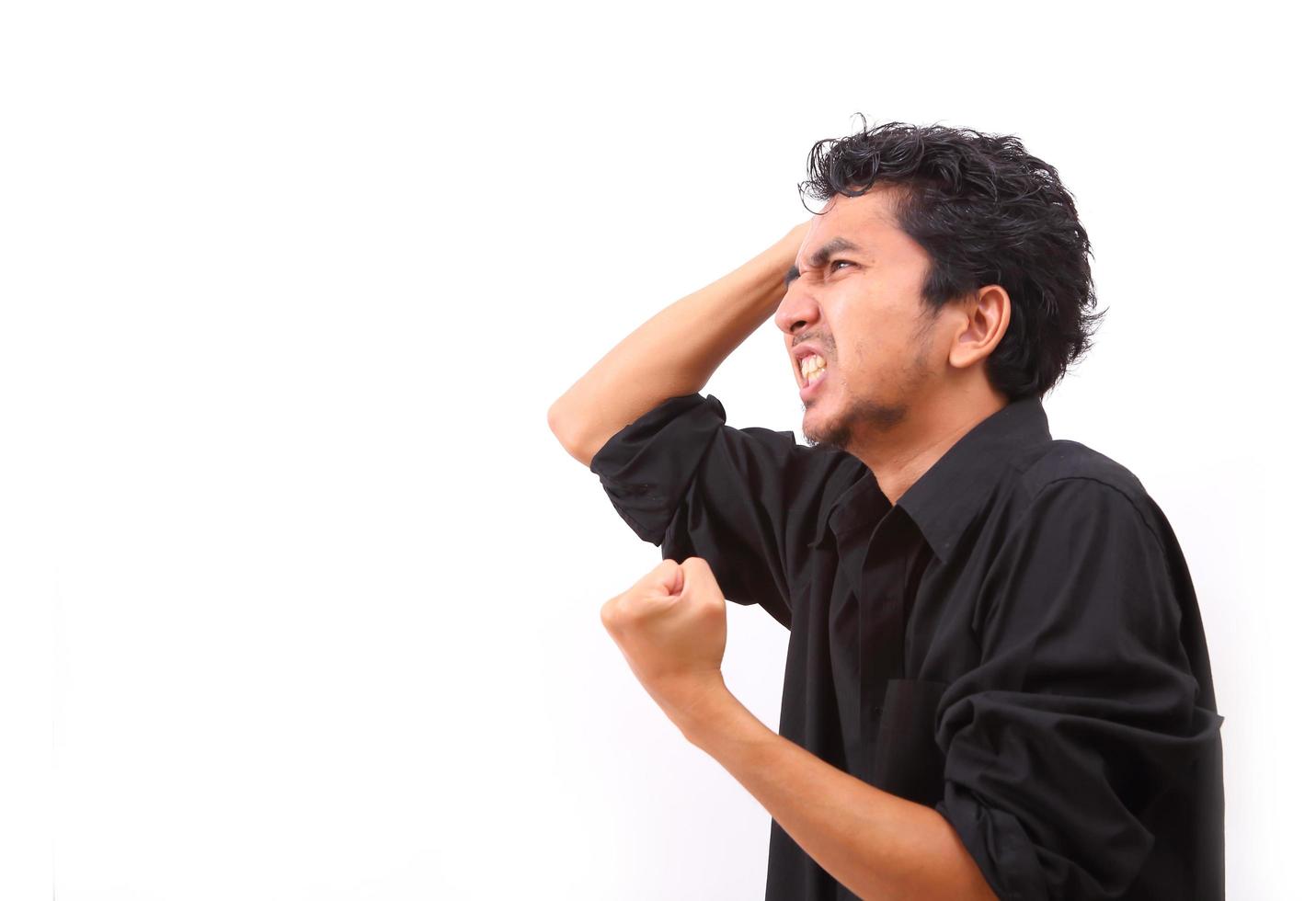 Young man furious over white background photo