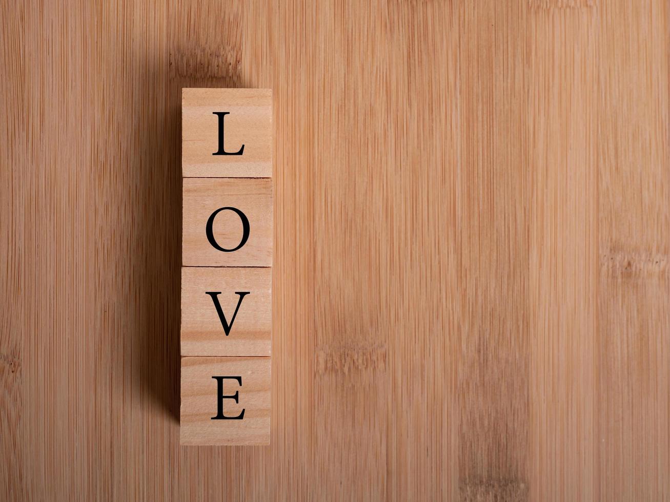 The word Love. Love on wooden cubes. Love theme. Valentine's day photo