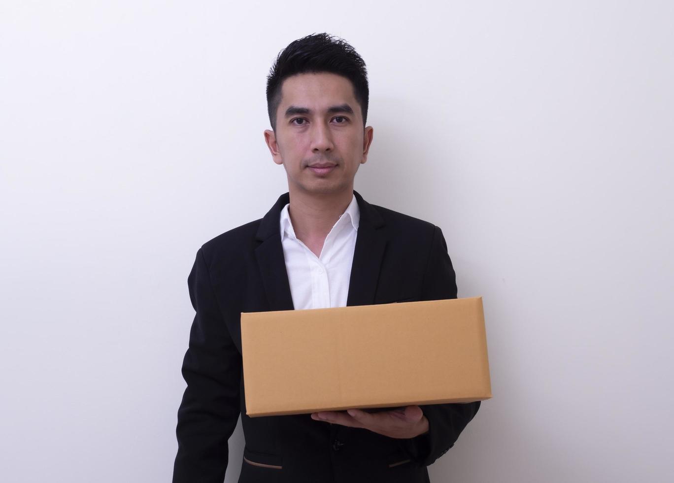 Shop assistant brings the parcel, isolated, white background photo