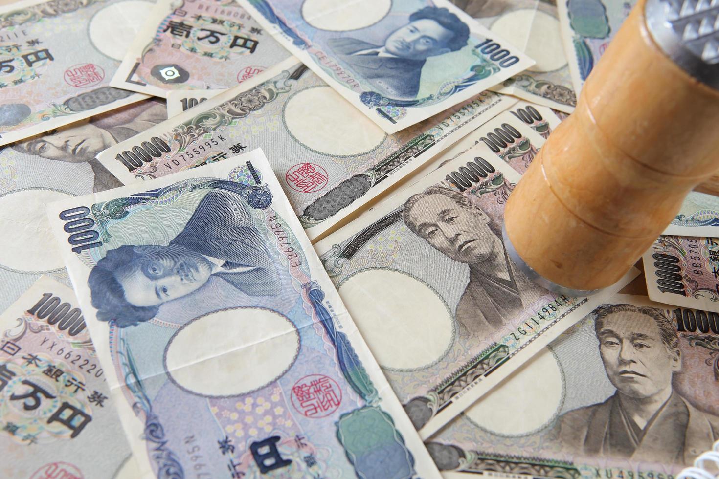 Wooden gavel and money photo