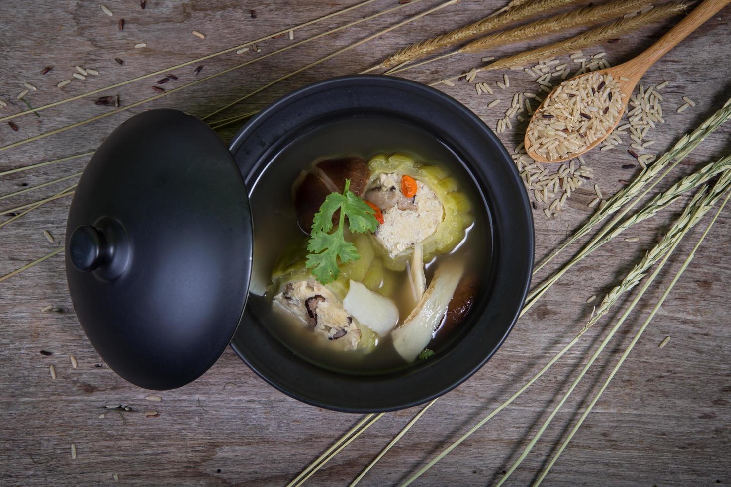Stuffed bitter gourd with minced pork in clear soup photo