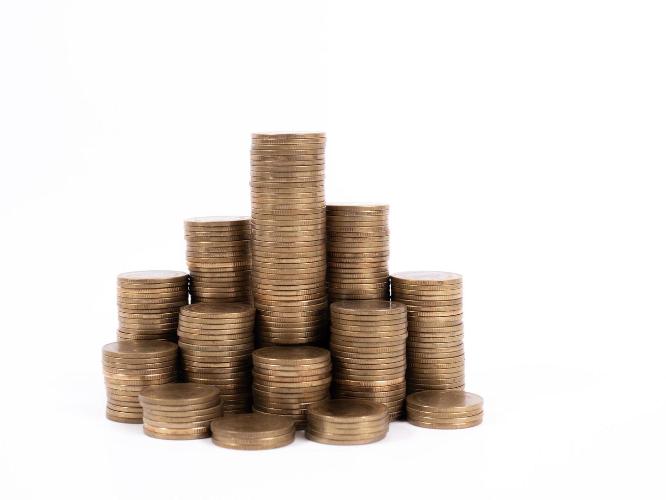 Stack of golden coins isolated on white background photo