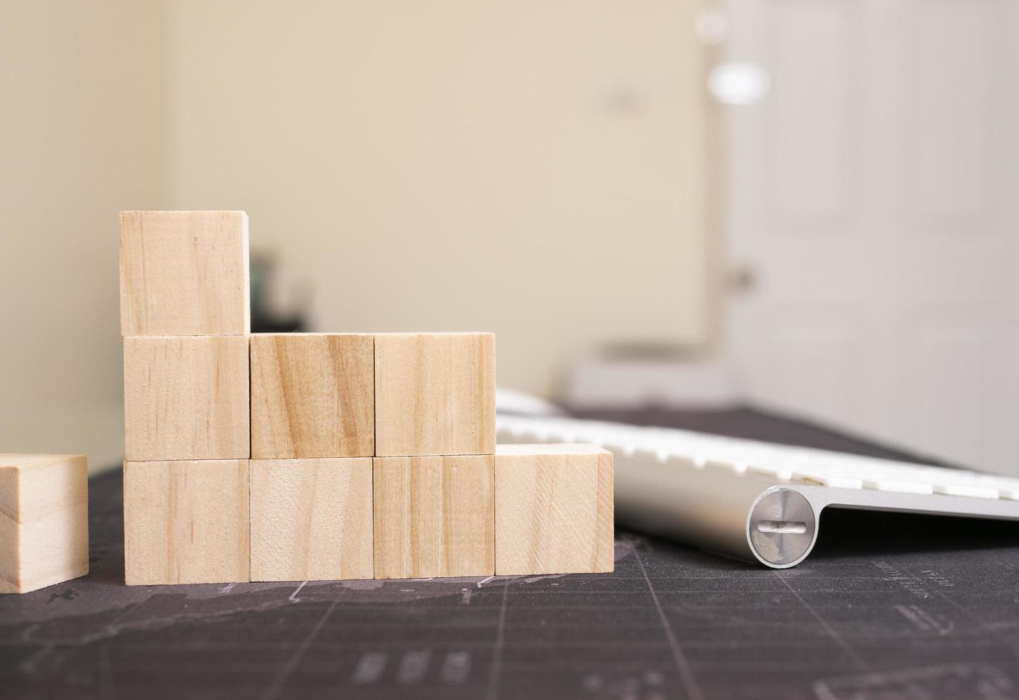 wood cube arrange in pyramid shape ,business concept photo