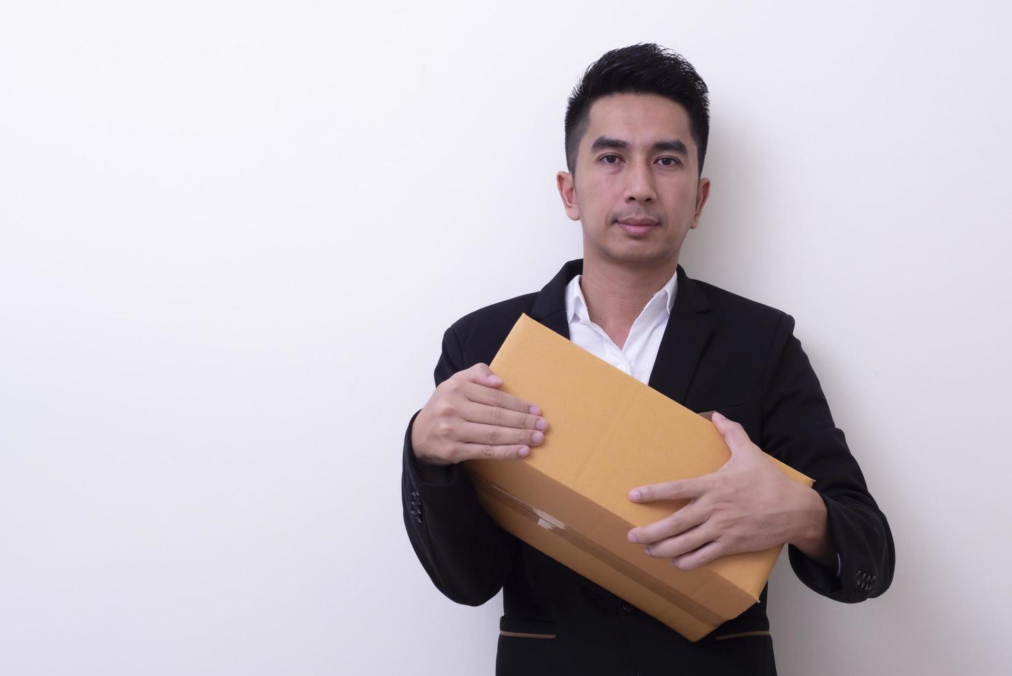 Shop assistant brings the parcel, isolated, white background photo