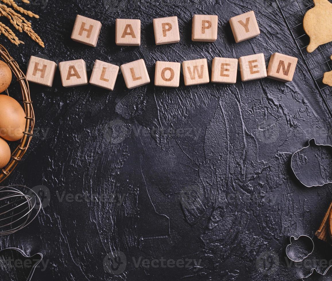 Top view of making Halloween cookies concept with ingredients and copy space. photo