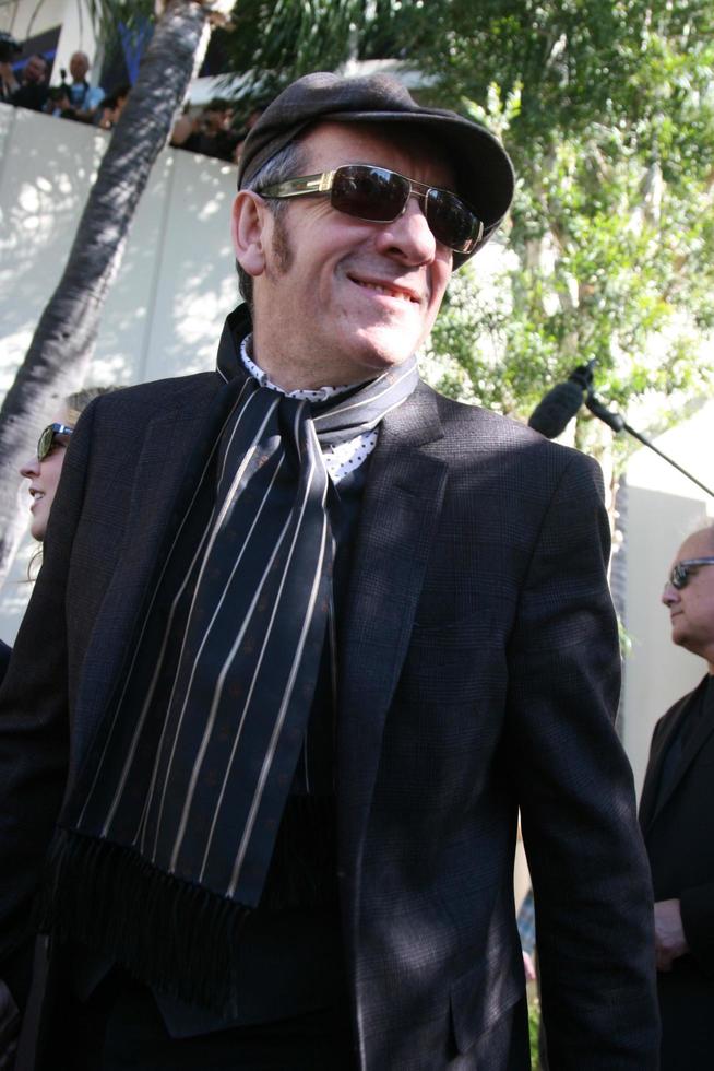 LOS ANGELES, FEB 9 - Elvis Costello at the Hollywood Walk of Fame Ceremony for Paul McCartney at Capital Records Building on February 9, 2012 in Los Angeles, CA photo