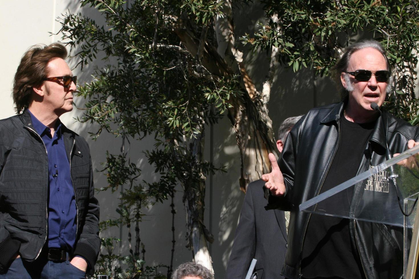 LOS ANGELES, FEB 9 - Paul McCartney, Neil Young at the Hollywood Walk of Fame Ceremony for Paul McCartney at Capital Records Building on February 9, 2012 in Los Angeles, CA photo