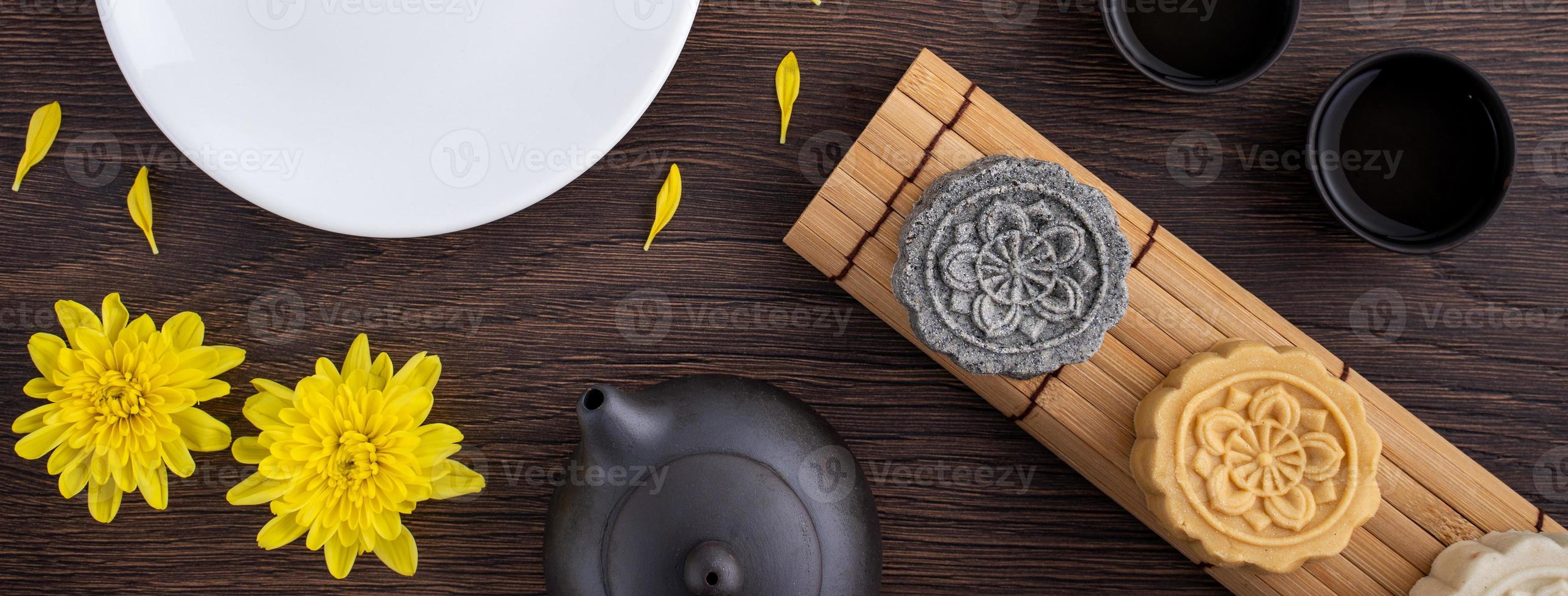 Colorful beautiful moon cake, mung bean cake, Champion Scholar Pastry cake for Mid-Autumn festival traditional gourmet dessert snack, top view, flat lay. photo