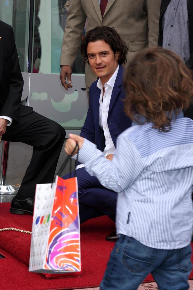 LOS ANGELES, APR 2 - Orlando Bloom, Flynn Bloom at the Orlando Bloom Hollywood Walk of Fame Star Ceremony at TCL Chinese Theater on April 2, 2014 in Los Angeles, CA photo