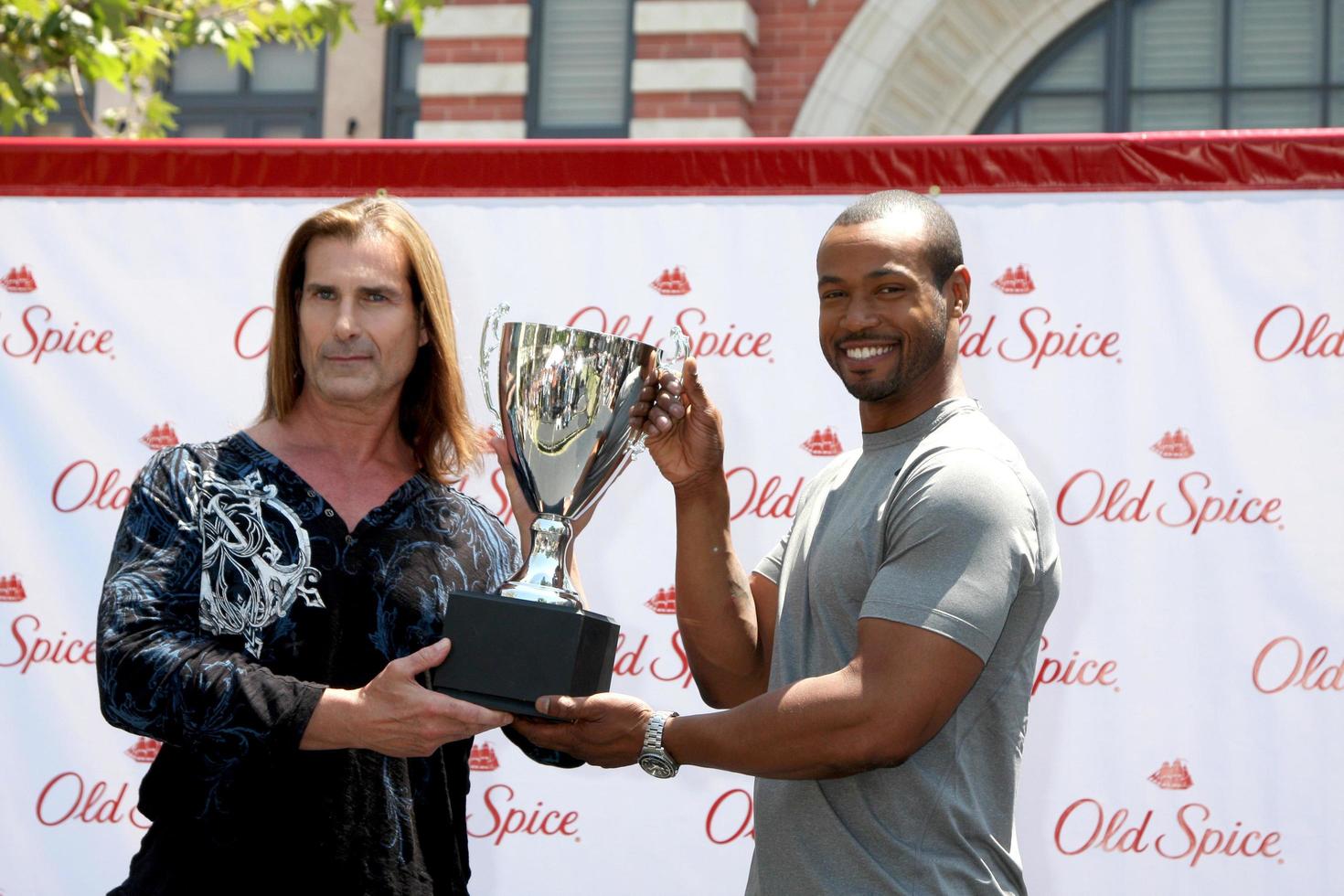 LOS ANGELES, JUL 28 - Fabio, Isaiah Mustafa at a public appearance to promote the Epic Old Spice Challenge at The Grove on July 28, 2011 in Los Angeles, CA photo
