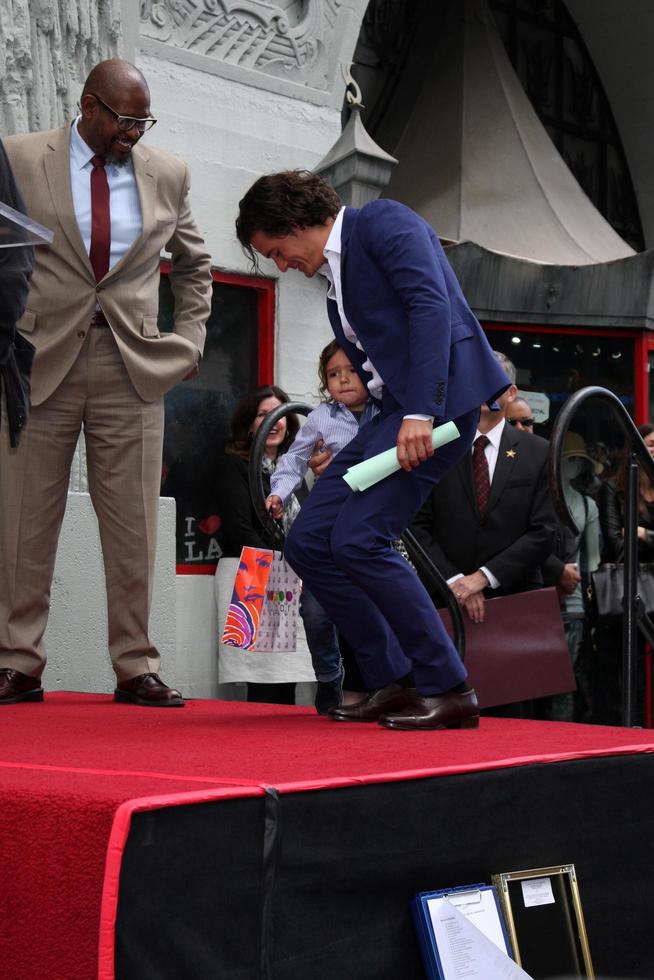 LOS ANGELES, APR 2 - Orlando Bloom, Flynn Bloom at the Orlando Bloom Hollywood Walk of Fame Star Ceremony at TCL Chinese Theater on April 2, 2014 in Los Angeles, CA photo