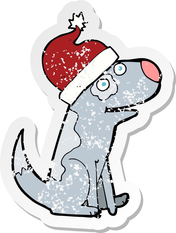retro distressed sticker of a cartoon dog wearing christmas hat vector