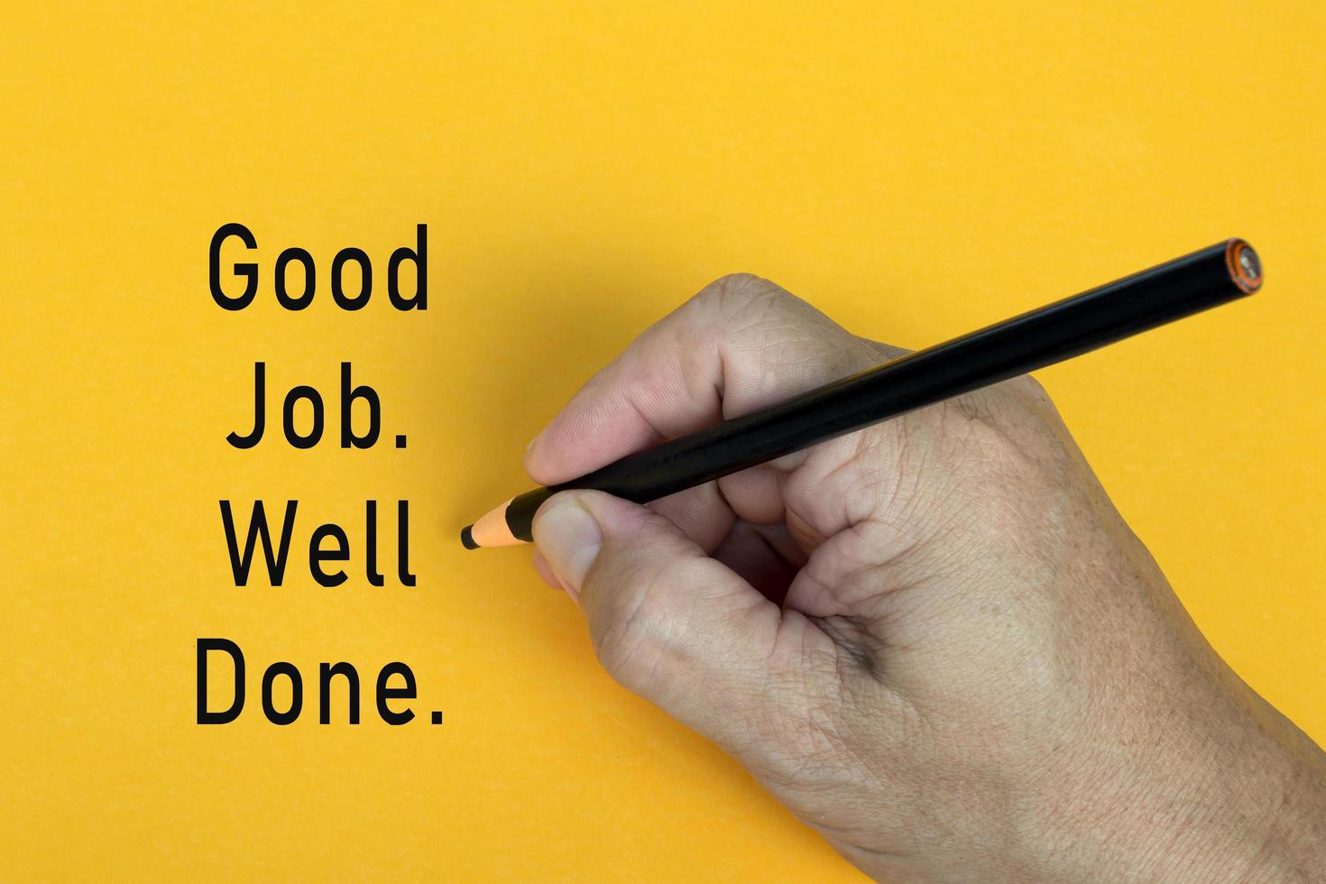 GOOD JOB WELL DONE text written on a yellow background. Business concept. photo