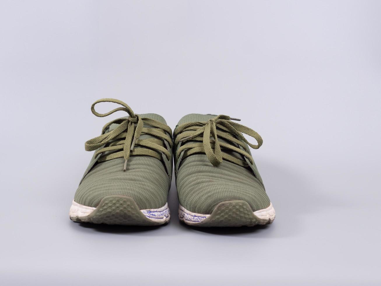 green dirty old vintage sneakers photo