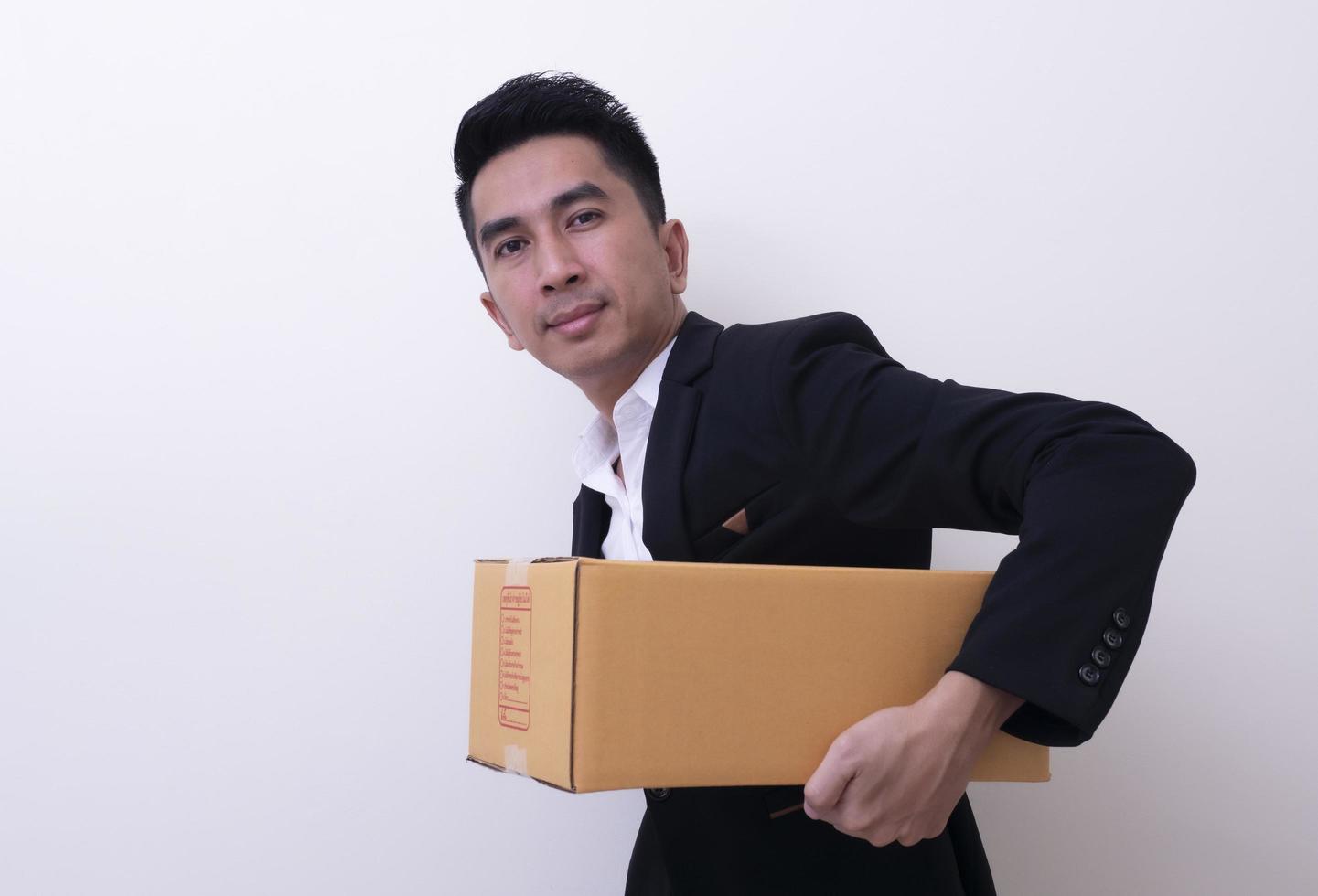 Shop assistant brings the parcel, isolated, white background photo