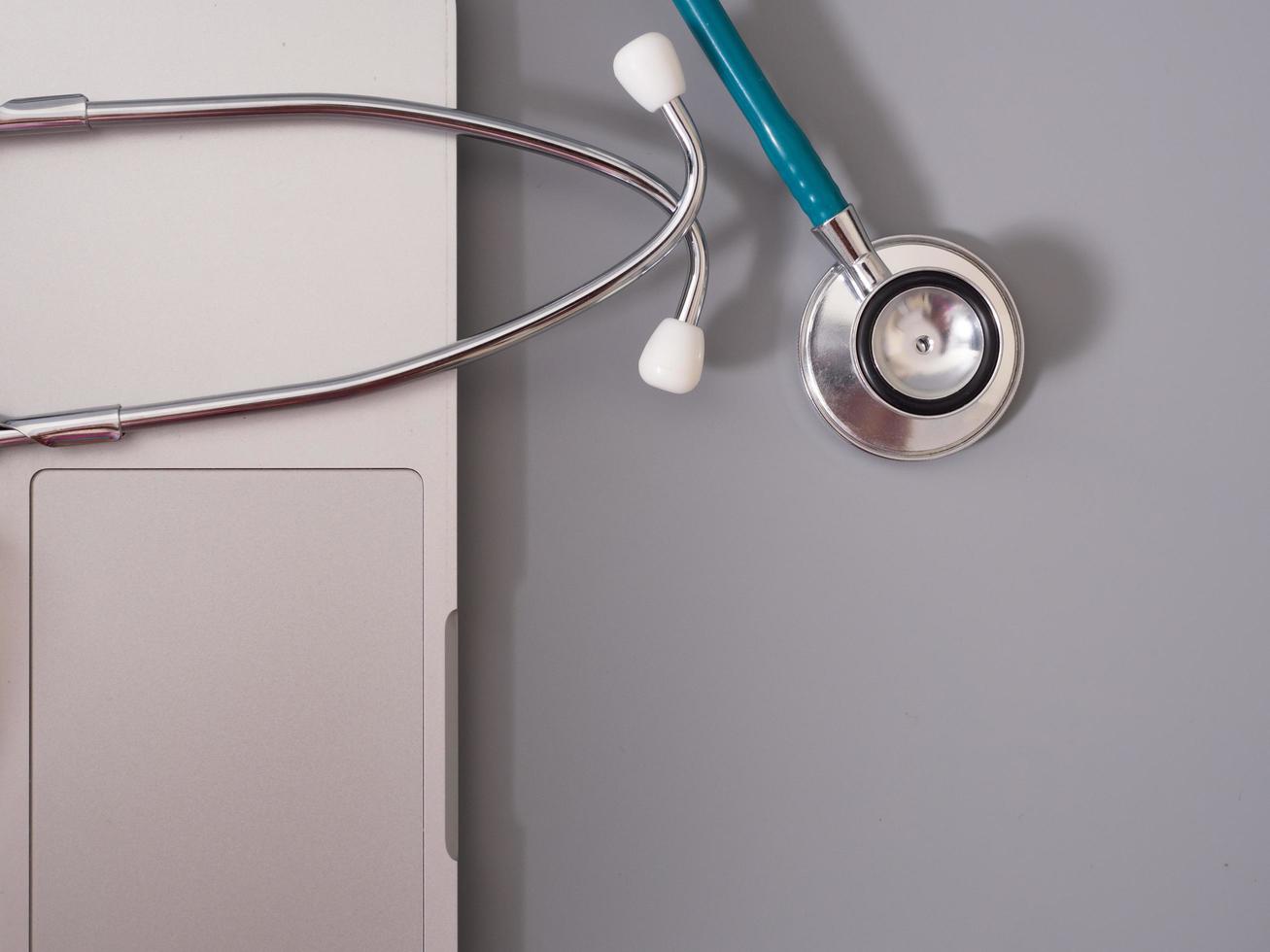 Stethoscope on computer ready to work photo