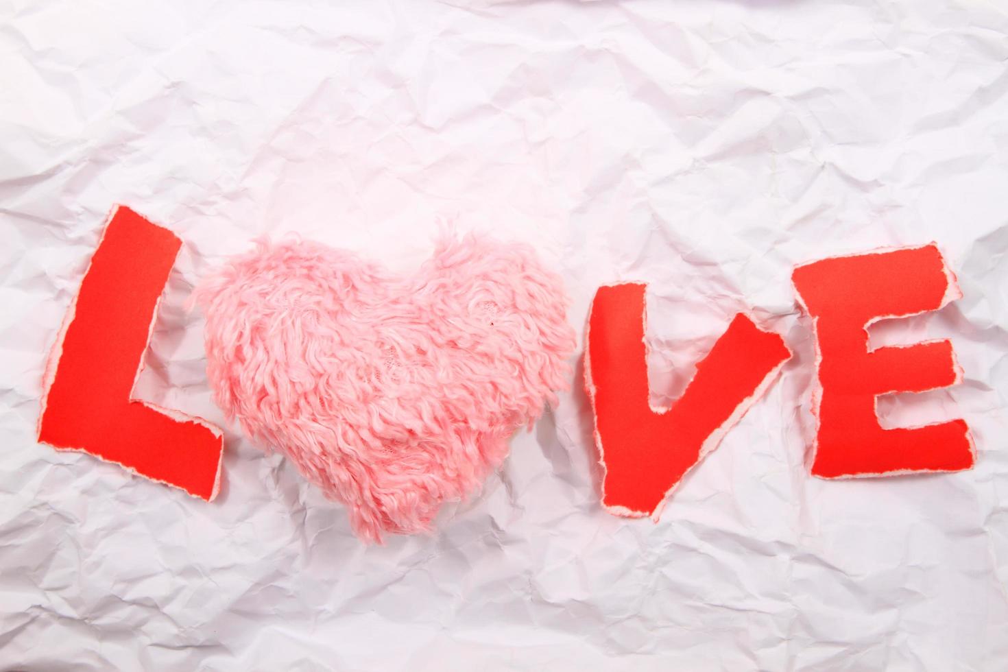 Love text   red  on a white background. photo