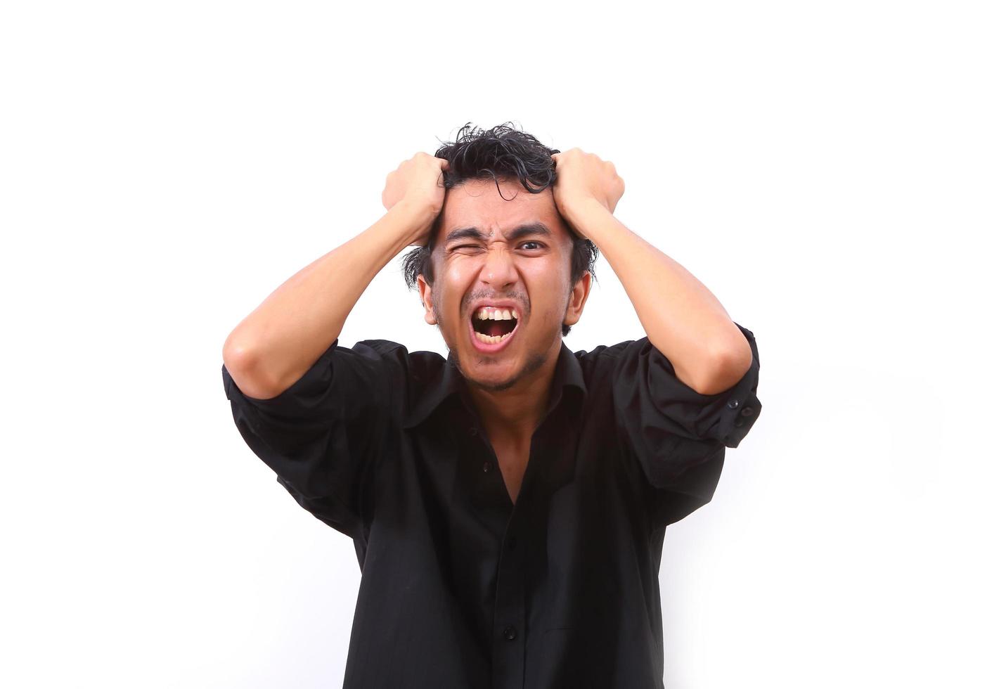 Young man furious over white background photo