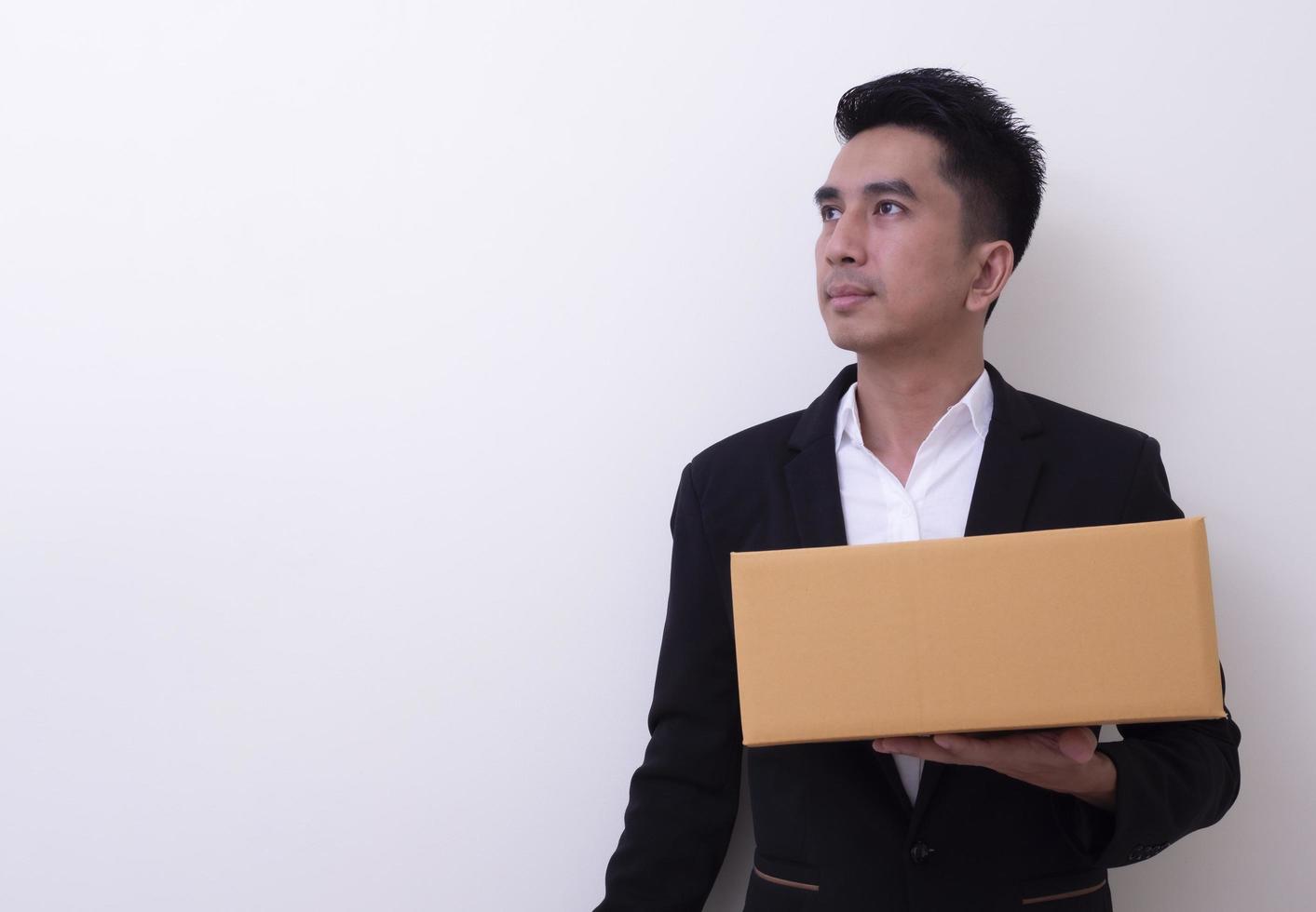 Shop assistant brings the parcel, isolated, white background photo