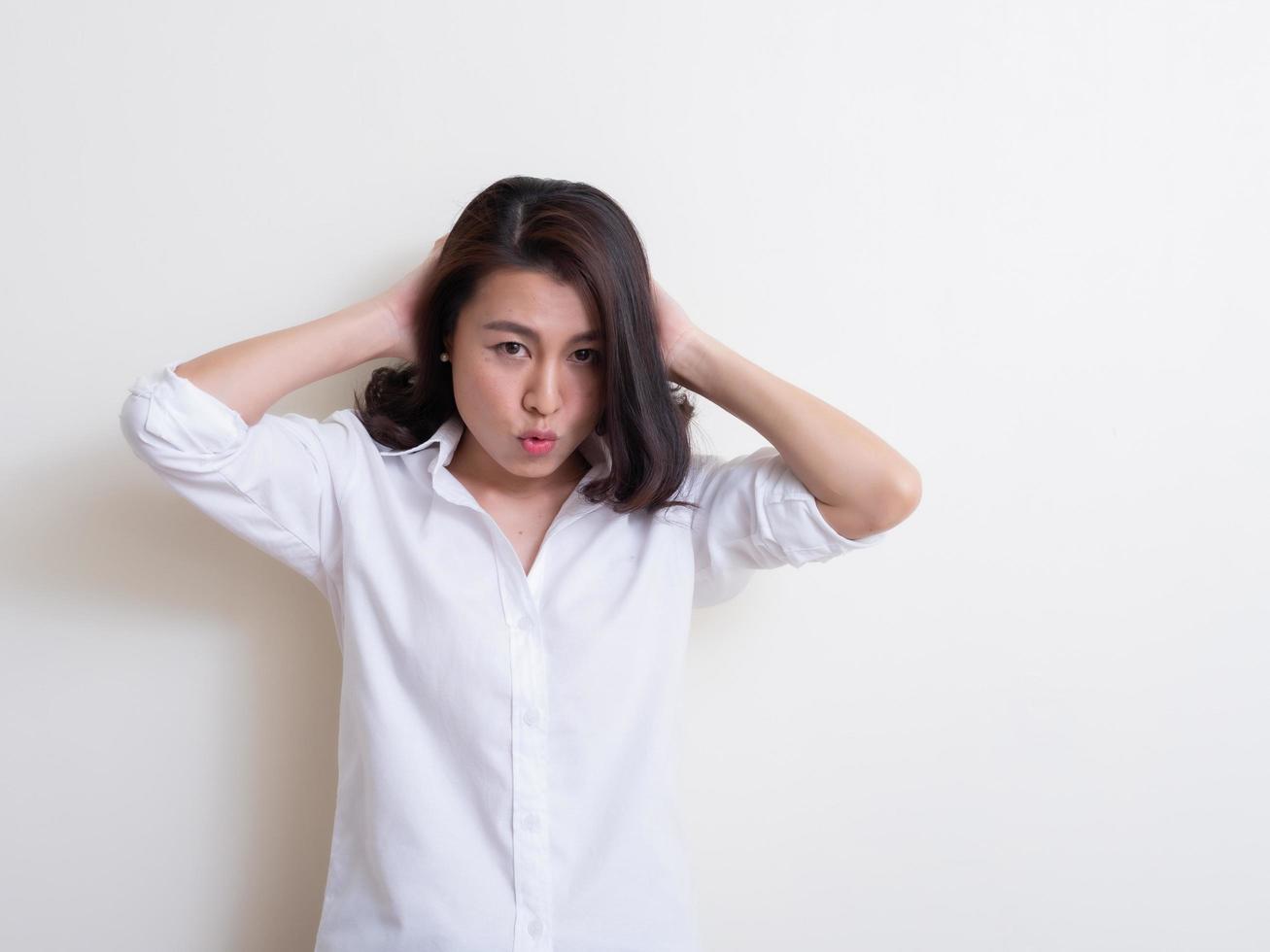 Portrait of young asian woman standing and smiling photo