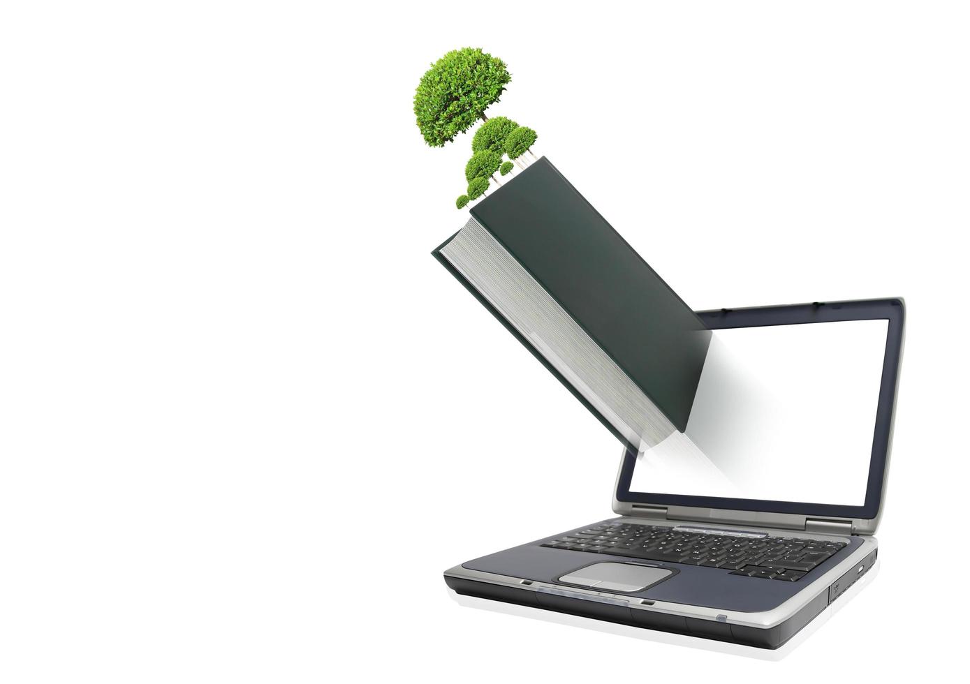 Books with a laptop on a white background photo