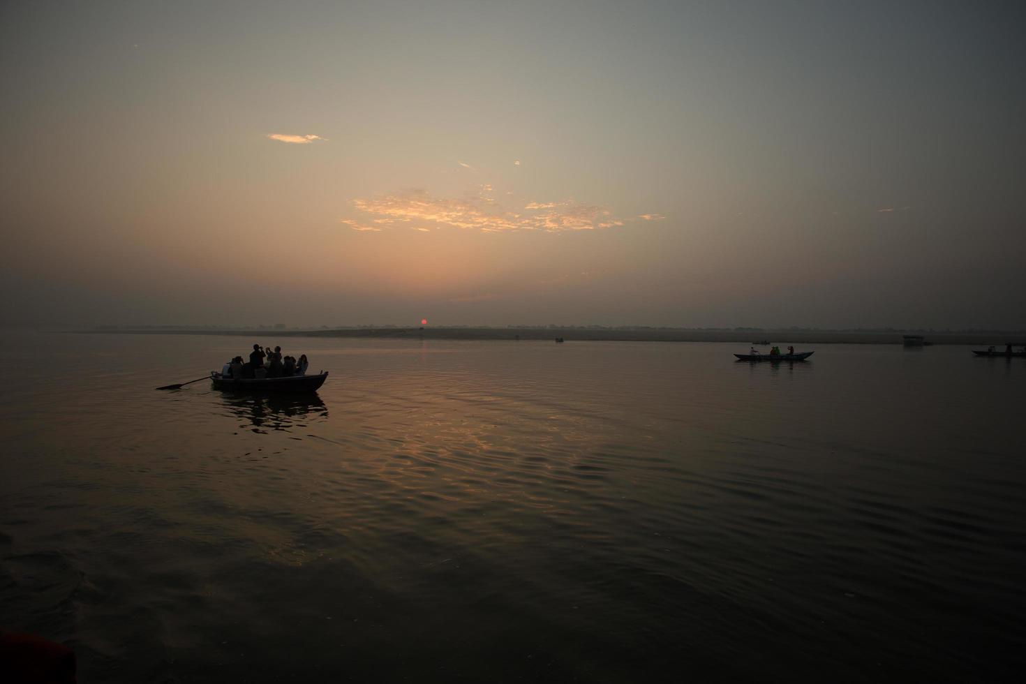 Sunrise on the Ganga river, Varanasi, India photo