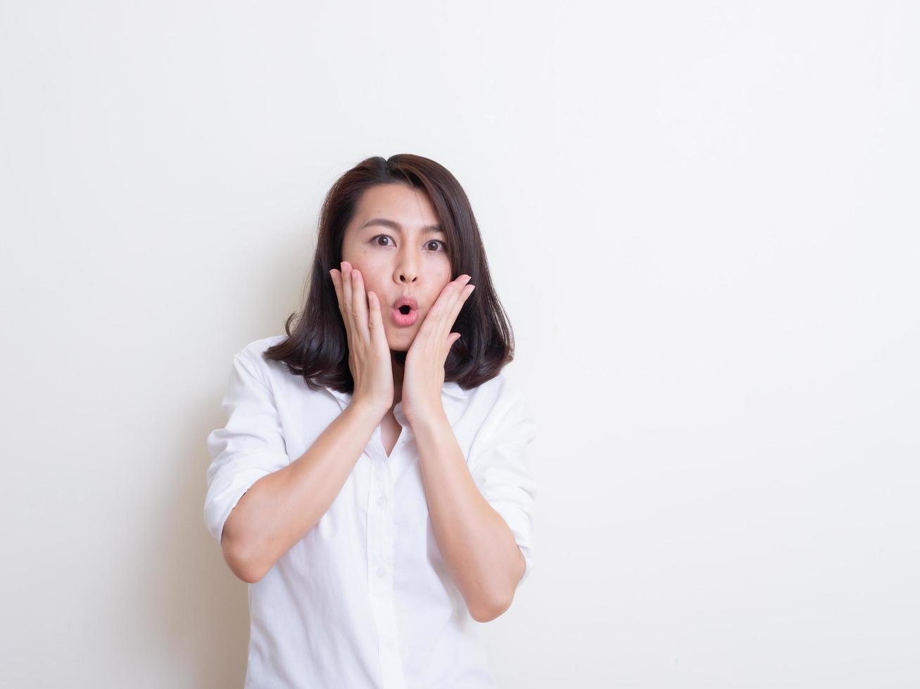 Portrait of young asian woman standing and smiling photo