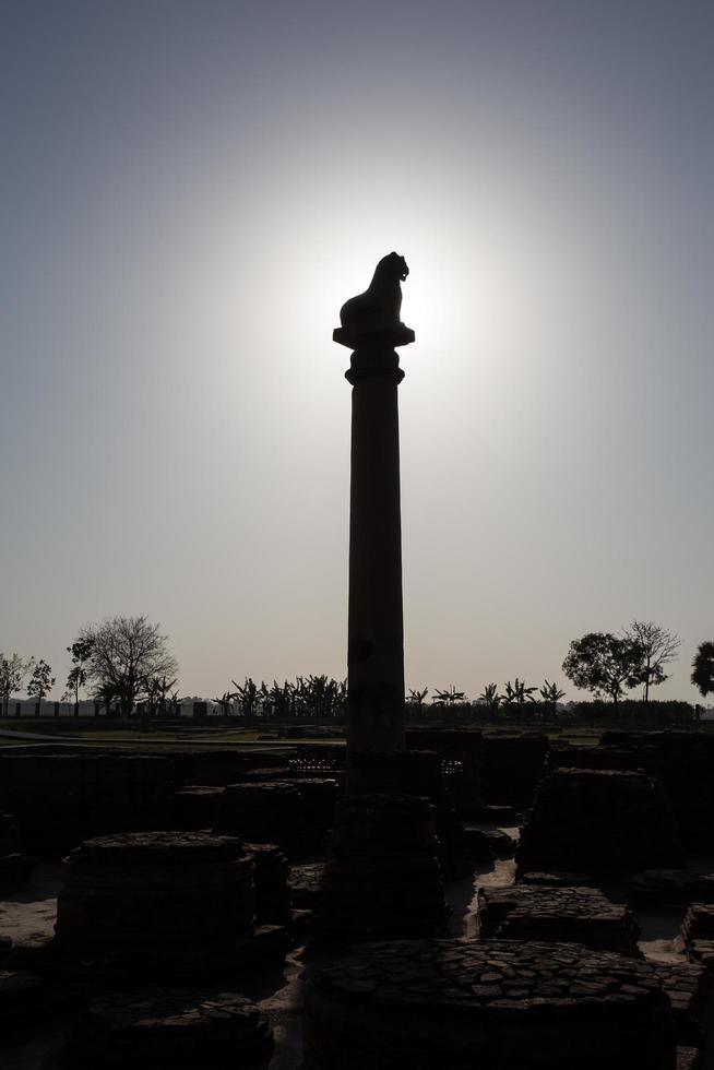 Ananda Stupa and Ashoka pillar photo