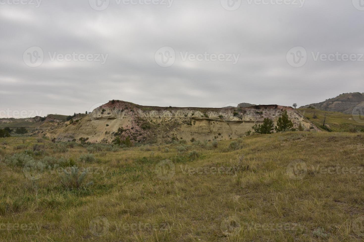 Butte in the Badlands of South Dakota photo