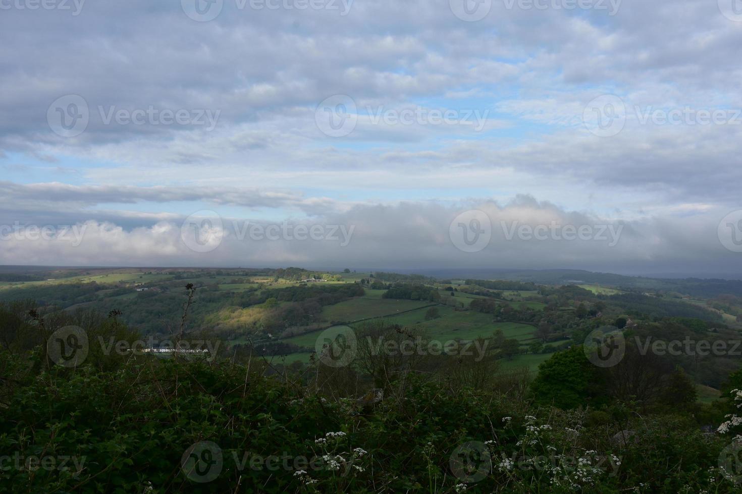 Dark Clouds Hovering Over a Valley in England photo