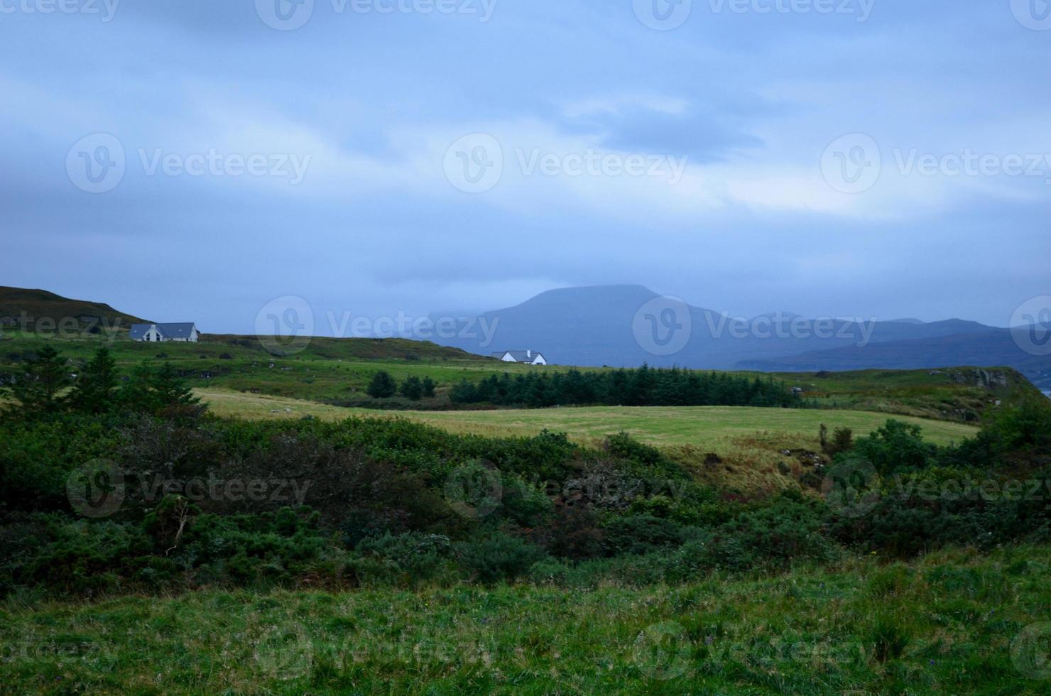 beautiful landscape in Scotland with some houses photo