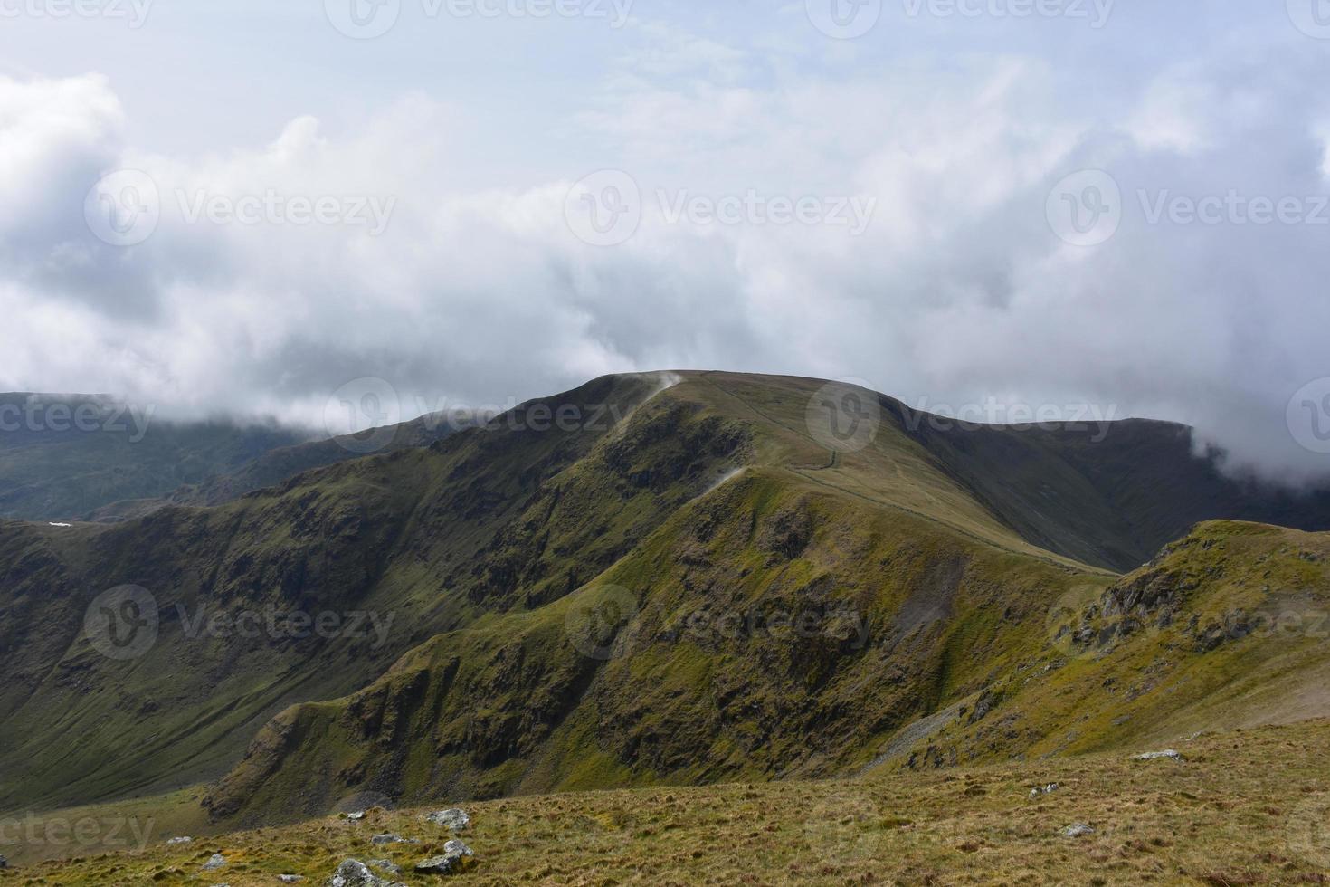 Clouds on Top of Fells in the Lake District photo